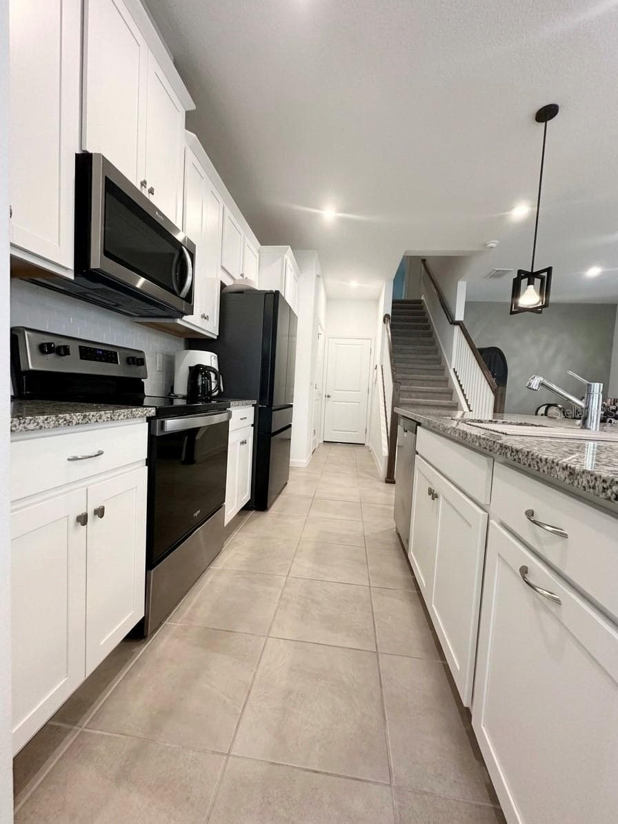 Kitchen layout - 1123 BOARDWALK PL, KISSIMMEE