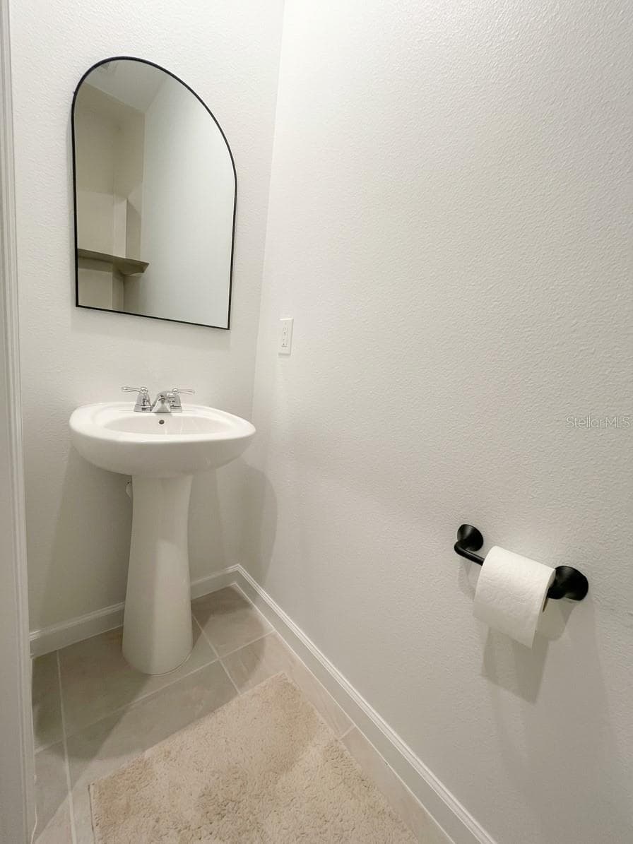 1/2 bathroom downstairs - 1123 BOARDWALK PL, KISSIMMEE
