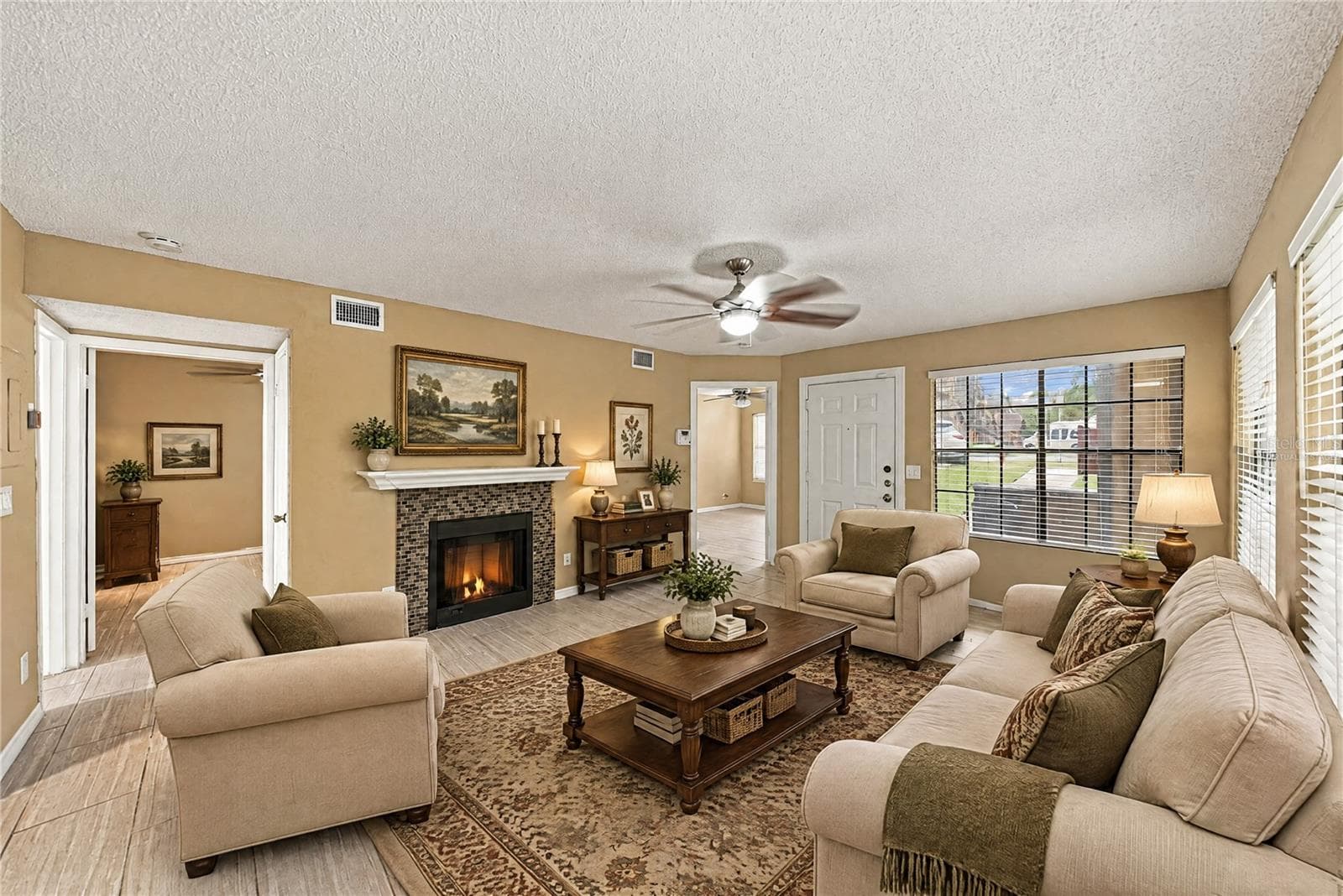 Virtually Staged Living Room - 485 FORESTWAY CIR #101, ALTAMONTE SPRINGS