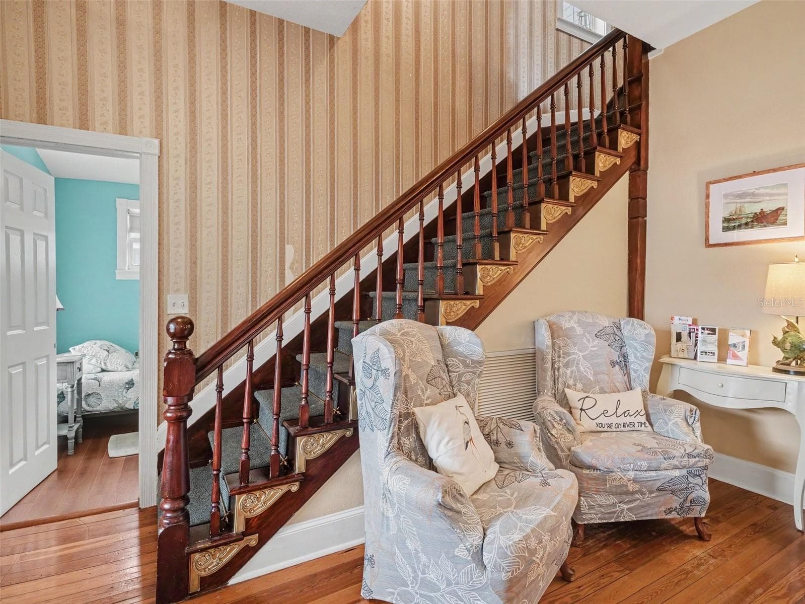 Hallway under stairs or seating area - 1529 1ST AVE W, BRADENTON