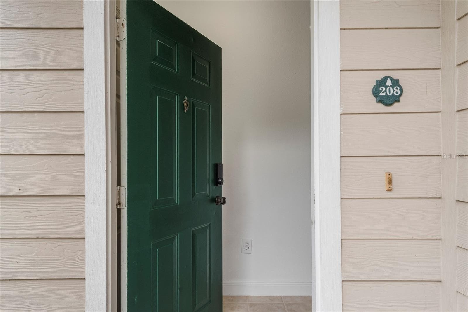 Welcome Home! Front door is equipped with keyless entry system. - 1300 EASTERN PECAN PL #208, WINTER GARDEN