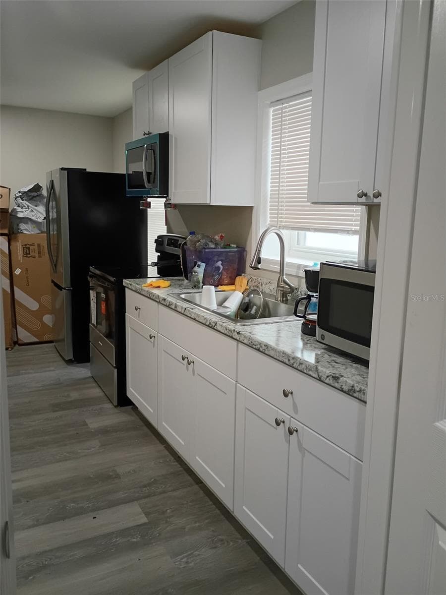 Single Family Residence at STRATHMORE, TAMPA, photo 2 of 2