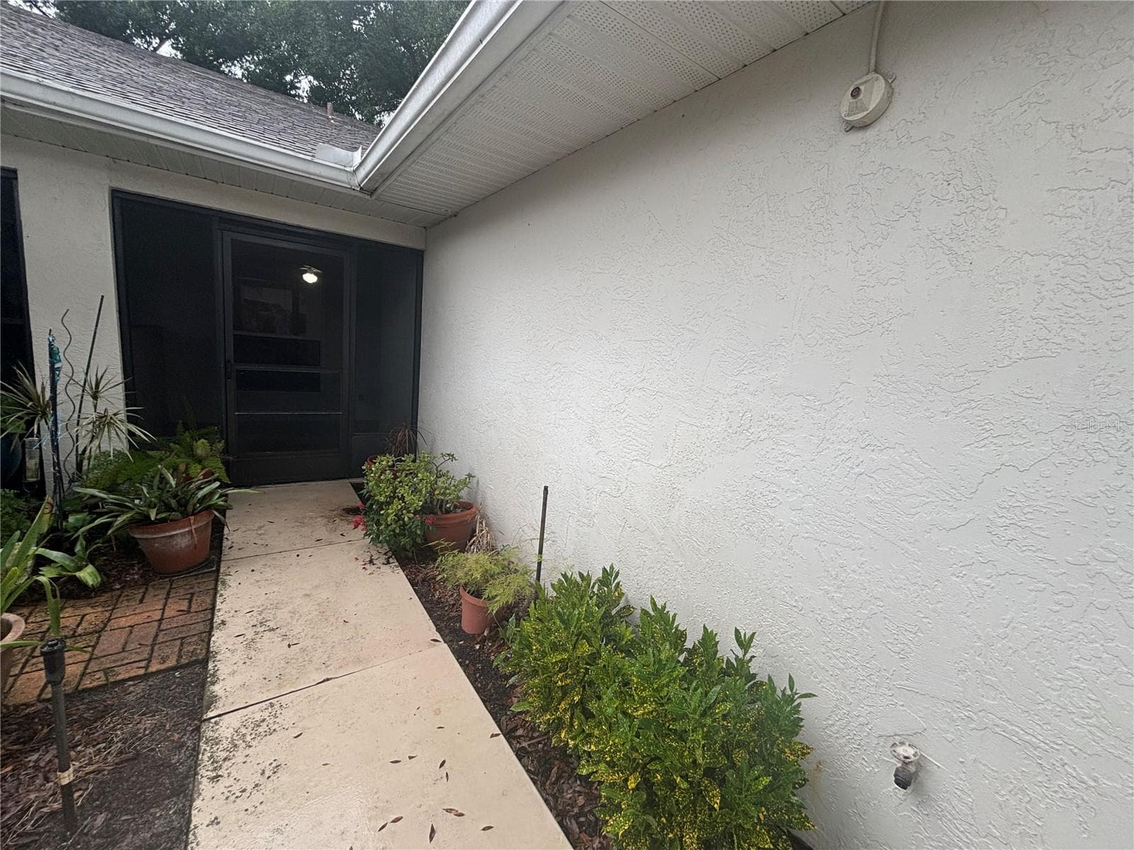 Single Family Residence at 8815 VILLAGE GREEN BLVD, CLERMONT, photo 2 of 25