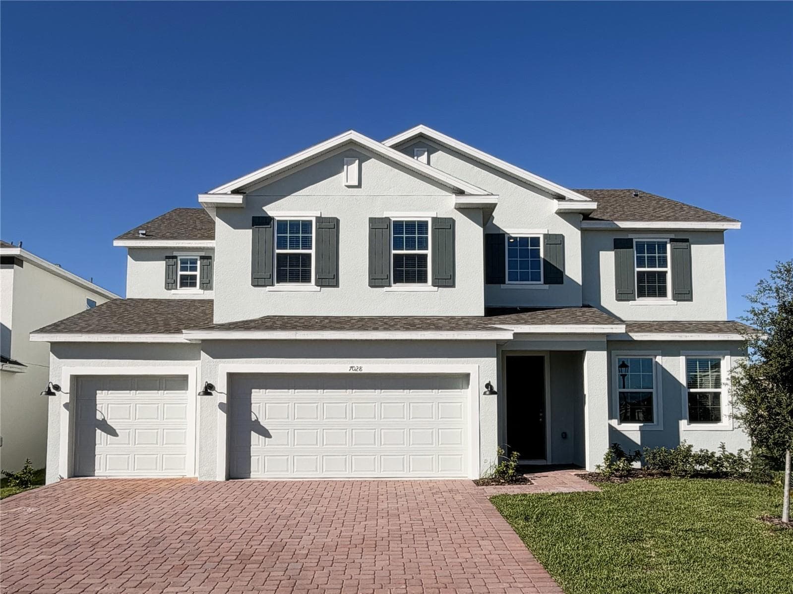 Front Exterior - 7028 ROLLING GARDENS LOOP, GROVELAND