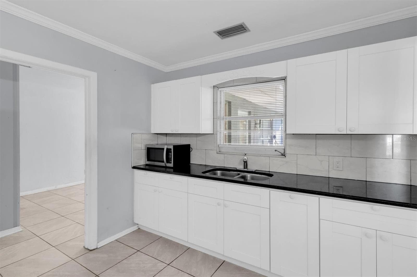 Single Family Residence at 7633 S CRESCENT LOOP, FLORAL CITY, photo 12 of 47