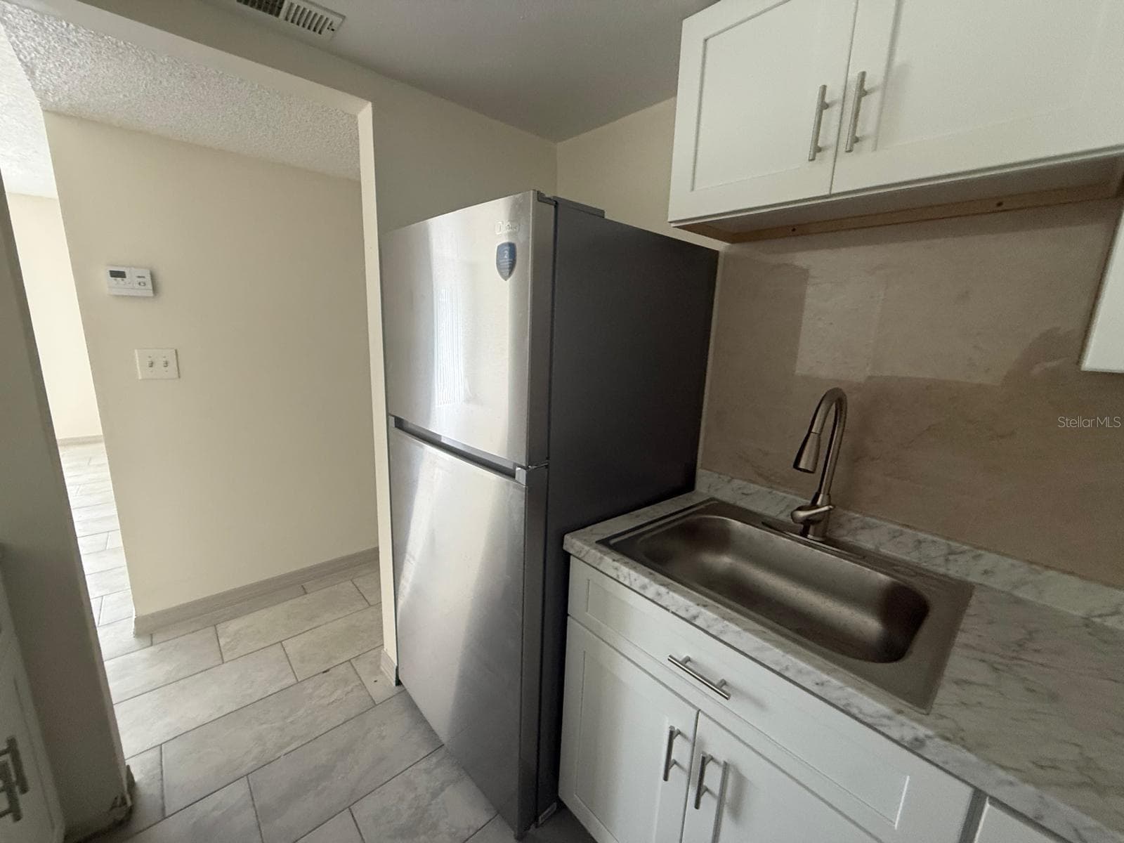 Condominium at 941 W OAK RIDGE RD #D, ORLANDO, photo 5 of 17
