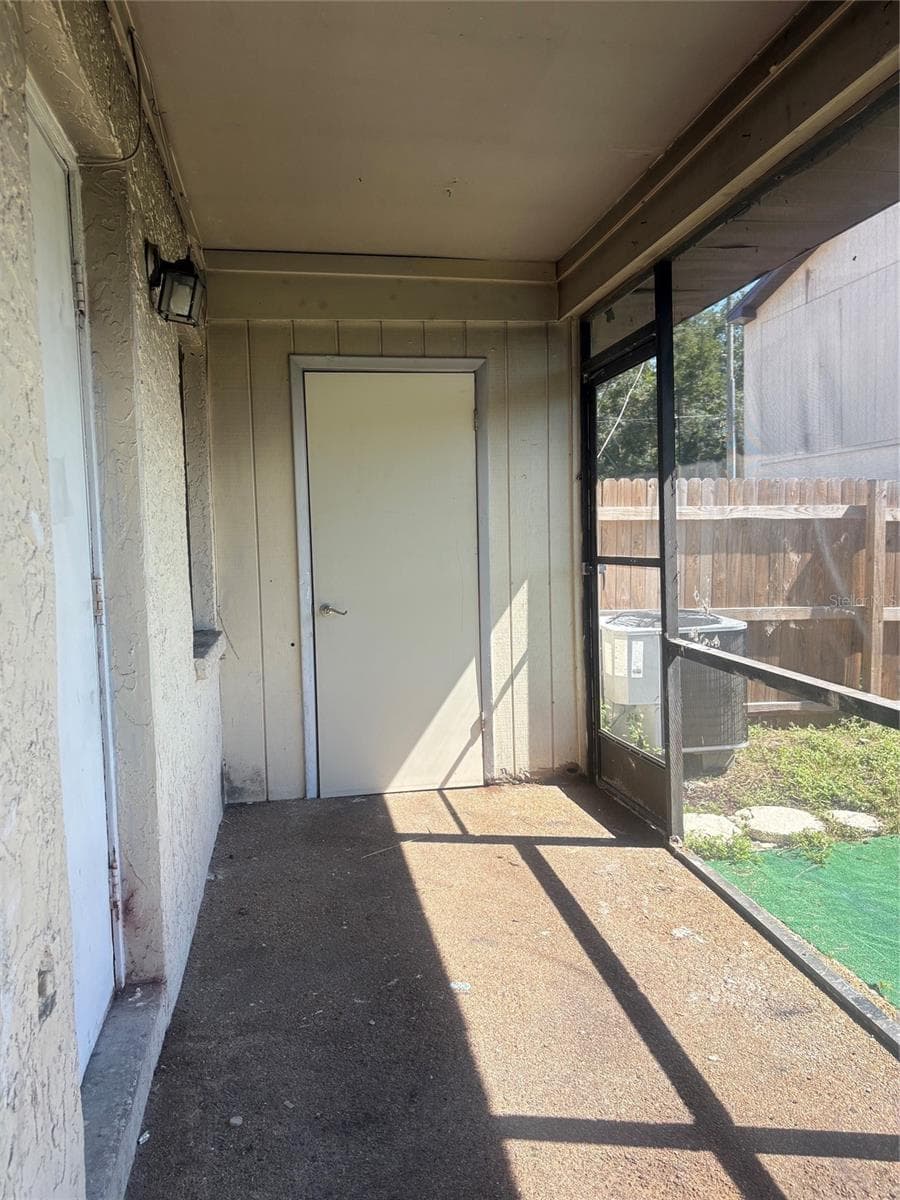 Patio to laundry room - 12723 LOCKEY LN, TAMPA