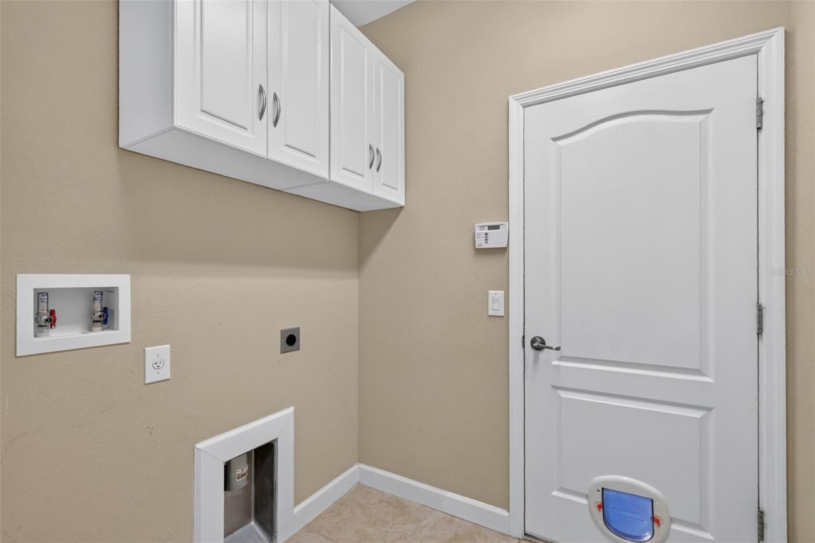 Laundry and access to the garage ~ - 4913 ROYCE DR, MOUNT DORA