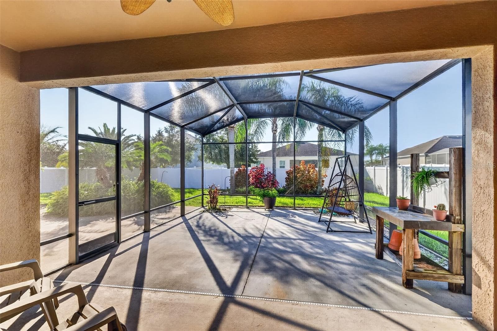 A beautiful covered patio and screened in lanai is perfect for the fall~ - 4913 ROYCE DR, MOUNT DORA