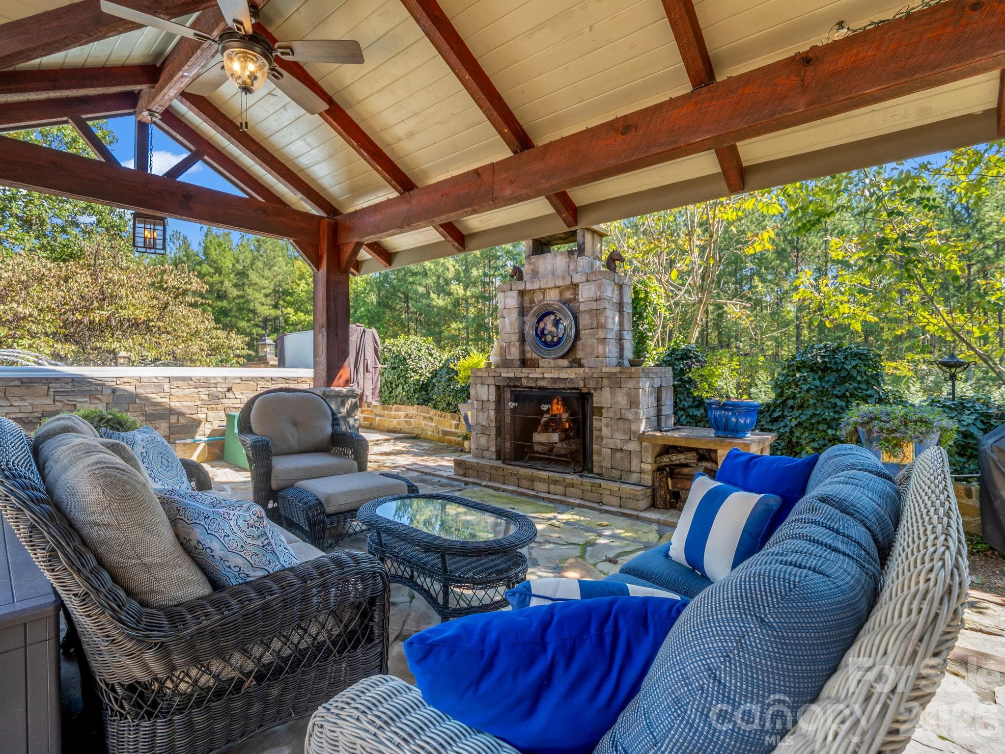 Outdoor pavilion and fireplace with Italian inspired ambiance - 140 Blazing Star Lane, Mill Spring