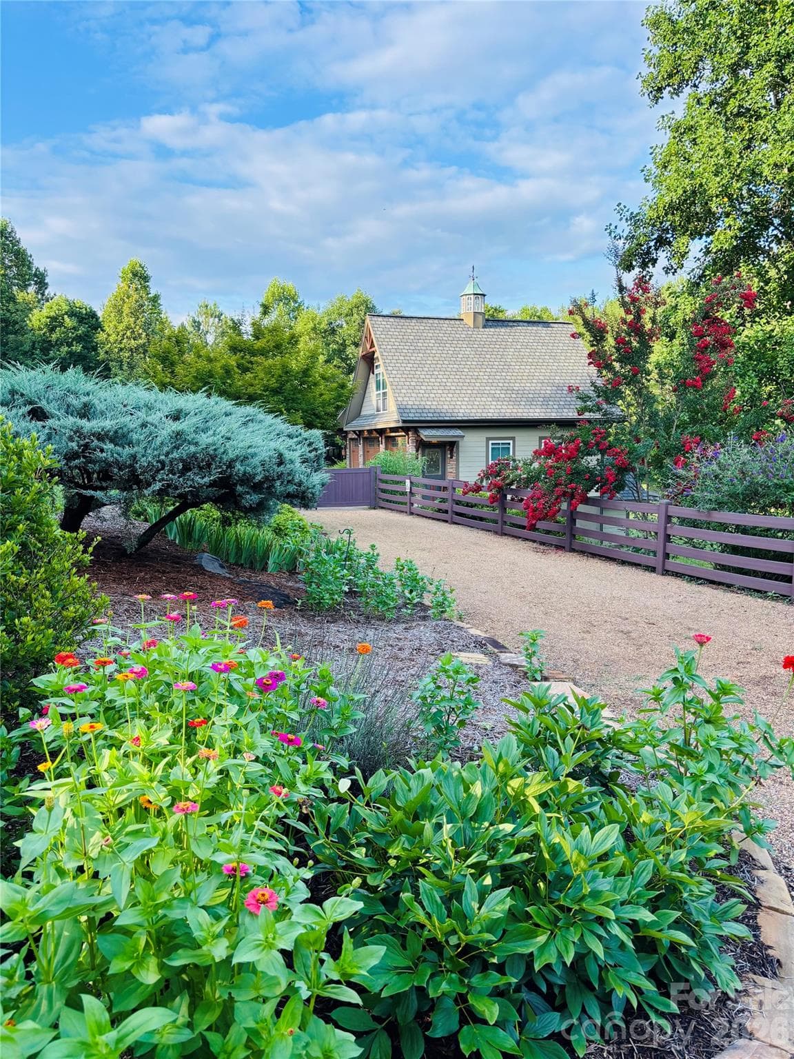 Gorgeous landscaping all around, over $200K of landscaping - 140 Blazing Star Lane, Mill Spring
