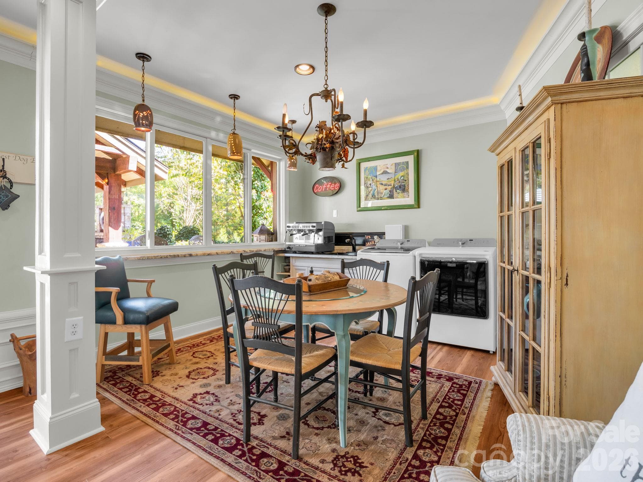 Dining/seating area in basement, 2nd set of washer/dryer - 140 Blazing Star Lane, Mill Spring