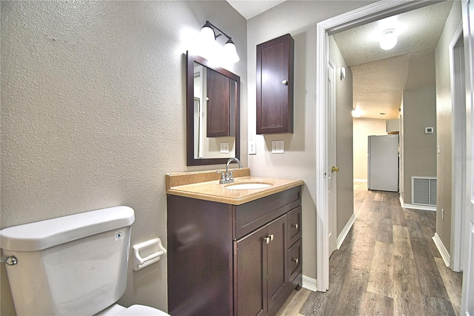 Hall Bathroom looking from tub/shower towards the doorway - 3779 RED OAK CT, LAKE WALES