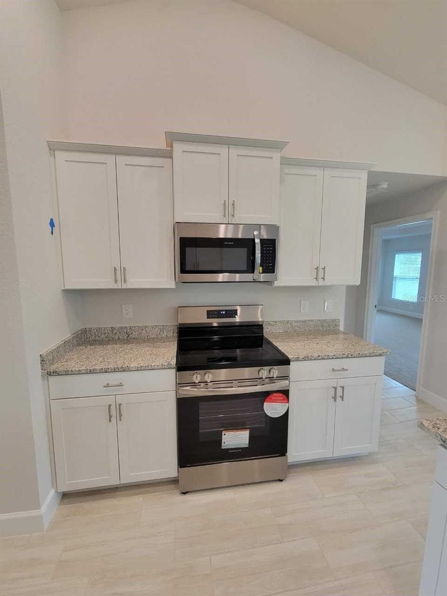 Picture of similar home for illustrative purposes only. Colors and features will vary! - 7181 SW 132ND AVE, OCALA