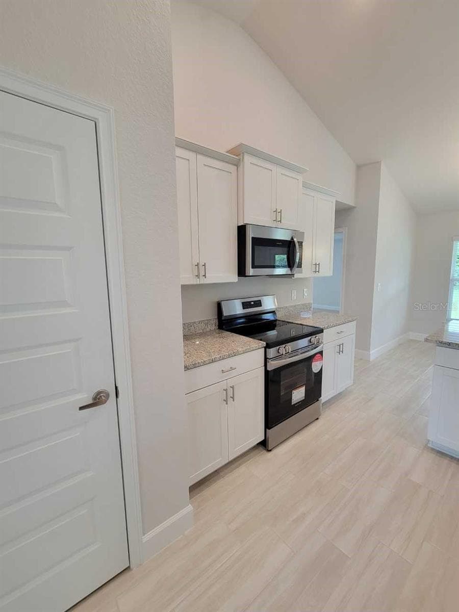Picture of similar home for illustrative purposes only. Colors and features will vary! - 7181 SW 132ND AVE, OCALA