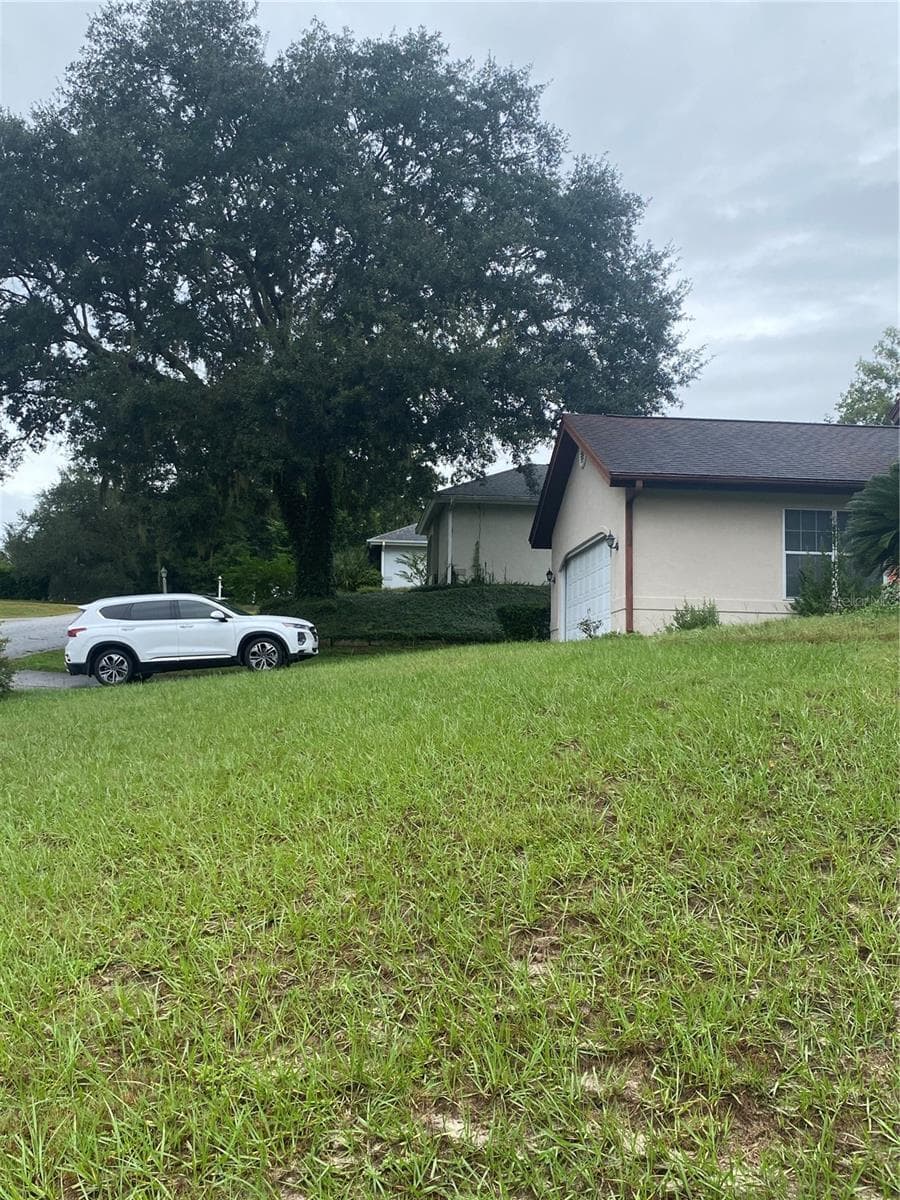 Front angle view. - 11492 SW 82ND COURT RD, OCALA