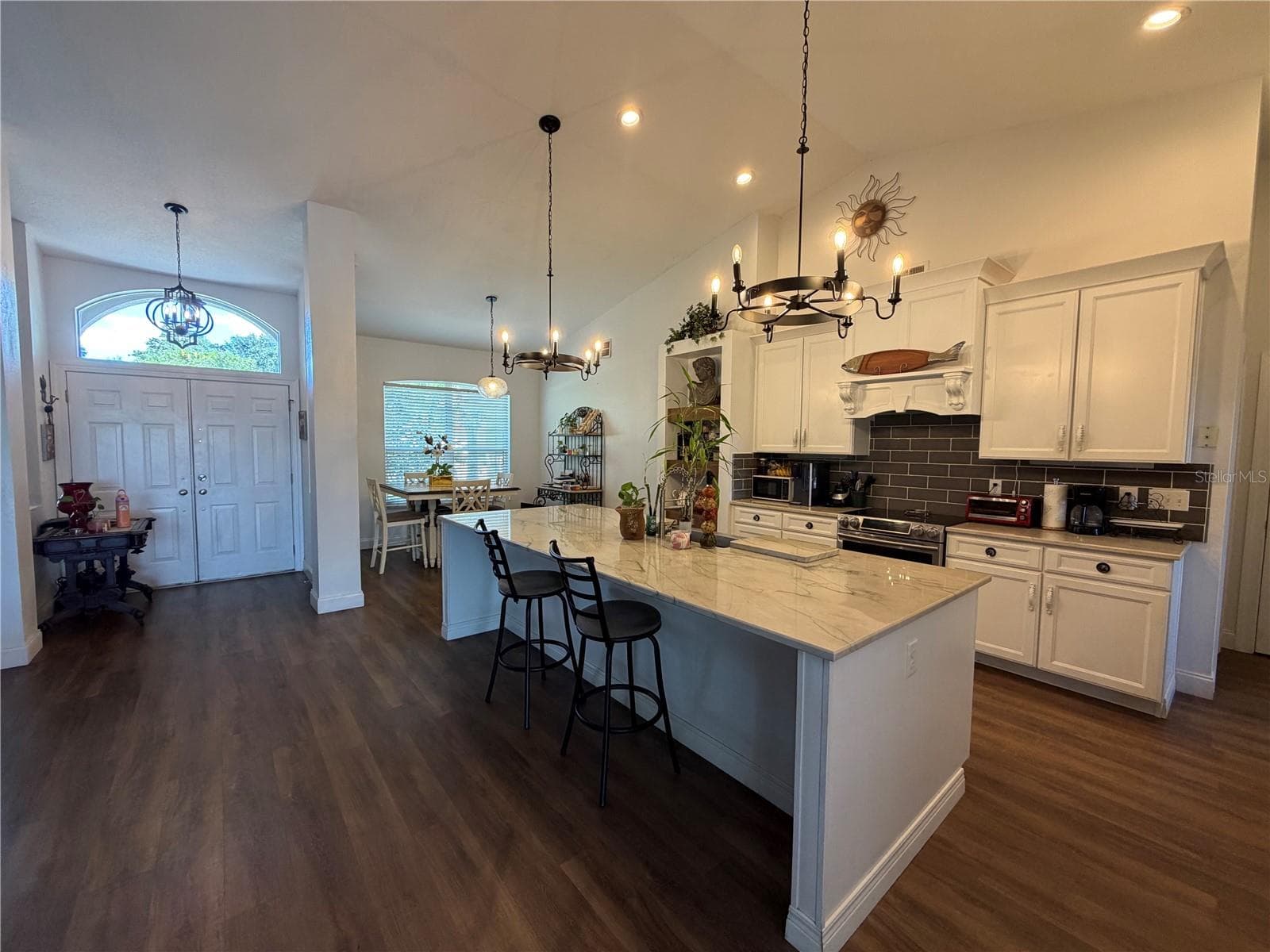 Kitchen and front door - 11413 ALAMEDA SANDRA DR, CLERMONT