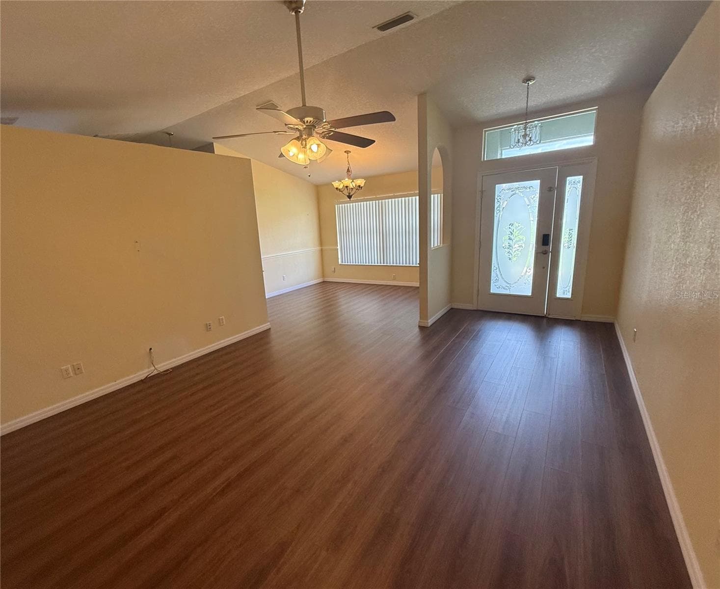 Living Room with view of the entry and dining room. - 4055 ALLURE LN, NORTH PORT