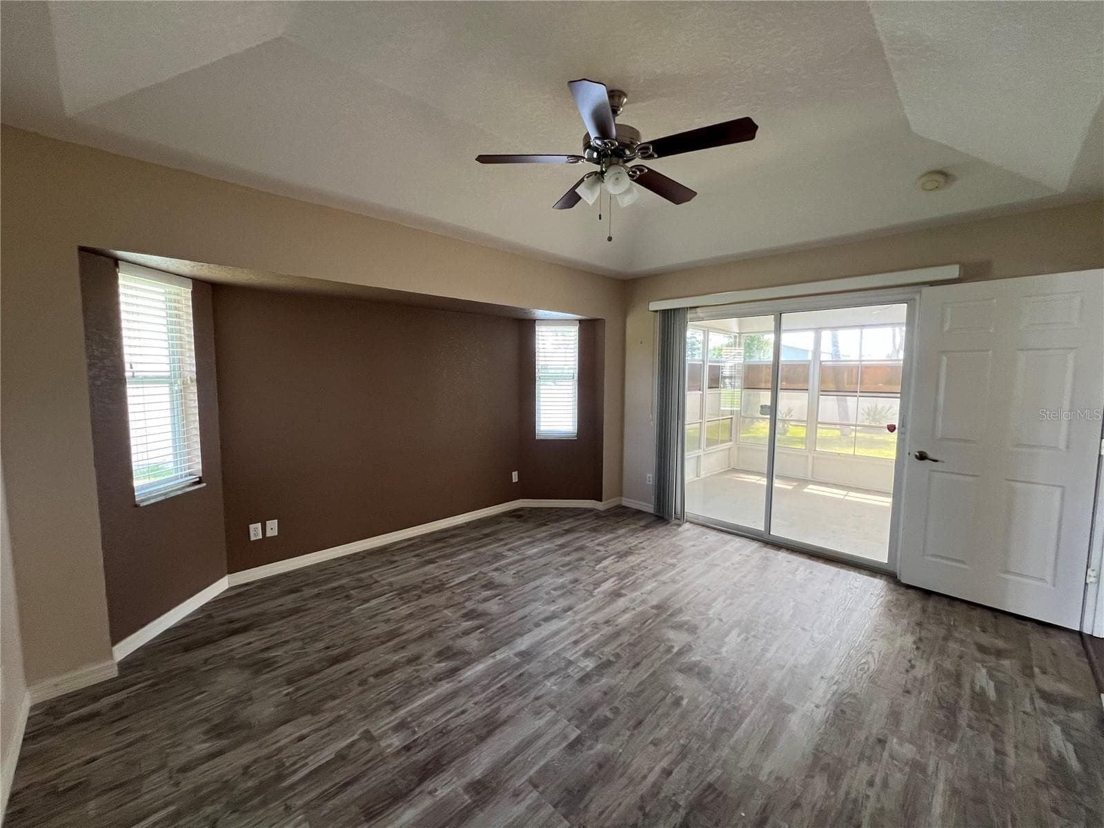 Primary Bedroom with sliders to lanai. - 4055 ALLURE LN, NORTH PORT