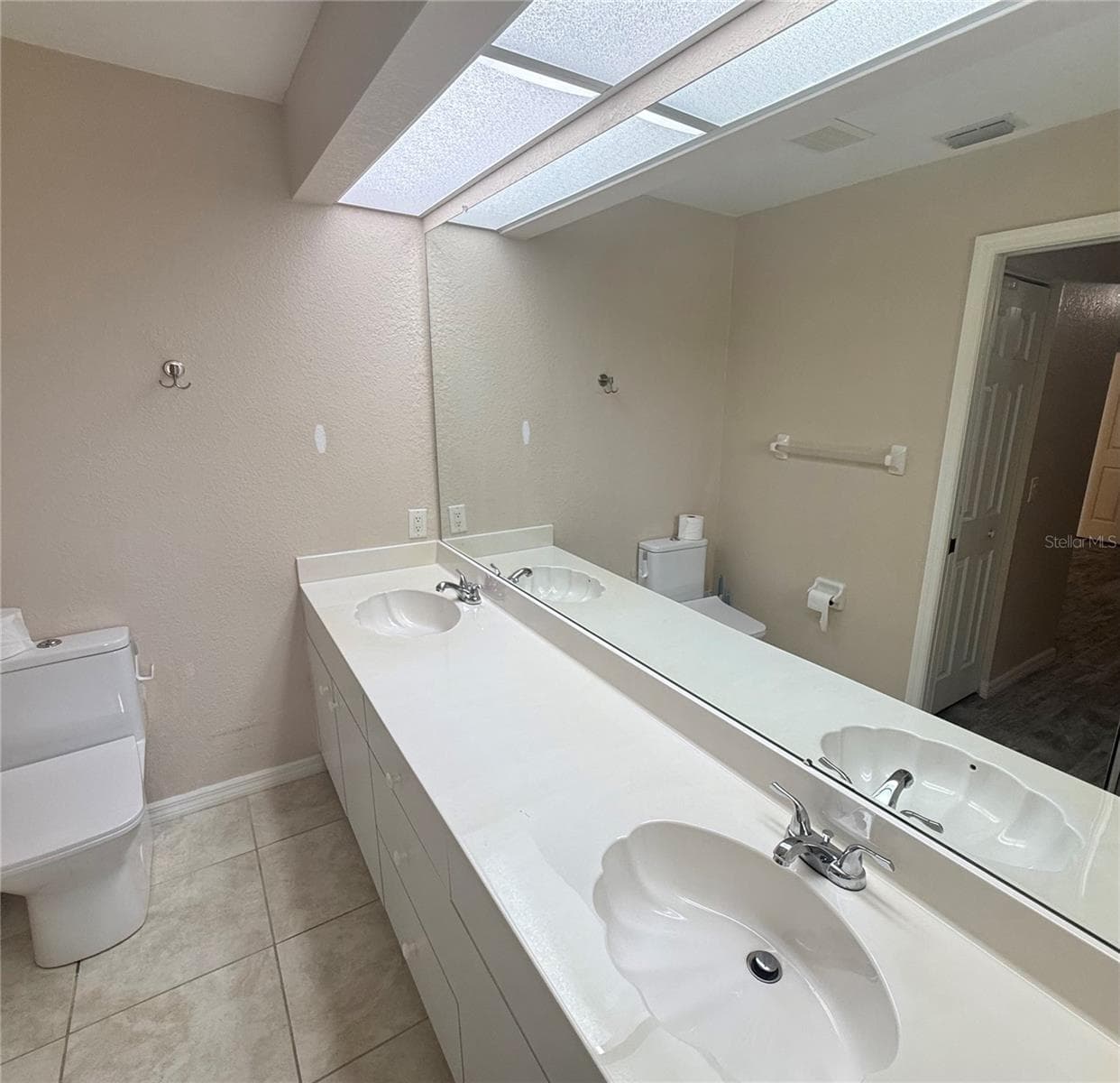 Primary Bathroom with dual sinks - 4055 ALLURE LN, NORTH PORT