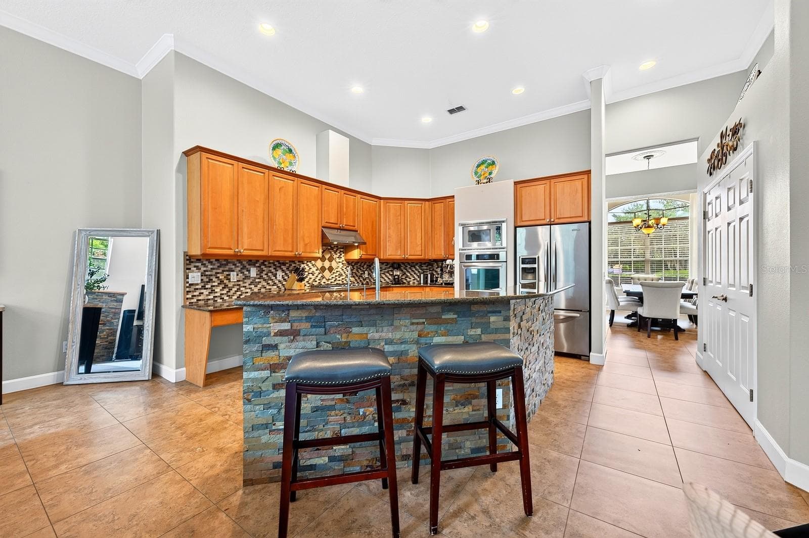 Open kitchen serves as the heart of the home. - 609 VIANA CT, WINTER SPRINGS