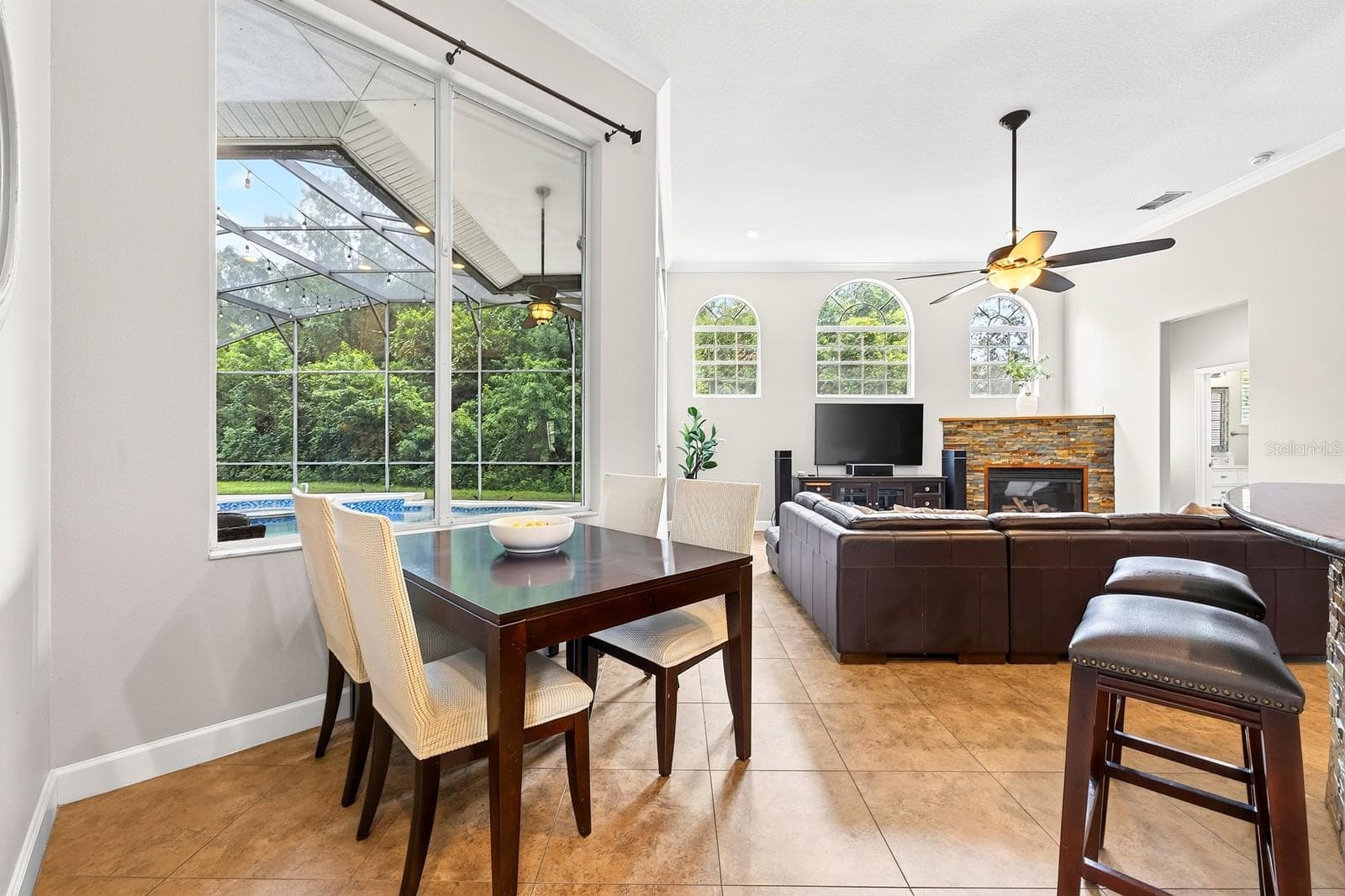 Breakfast nook off the kitchen, open to the family room. - 609 VIANA CT, WINTER SPRINGS