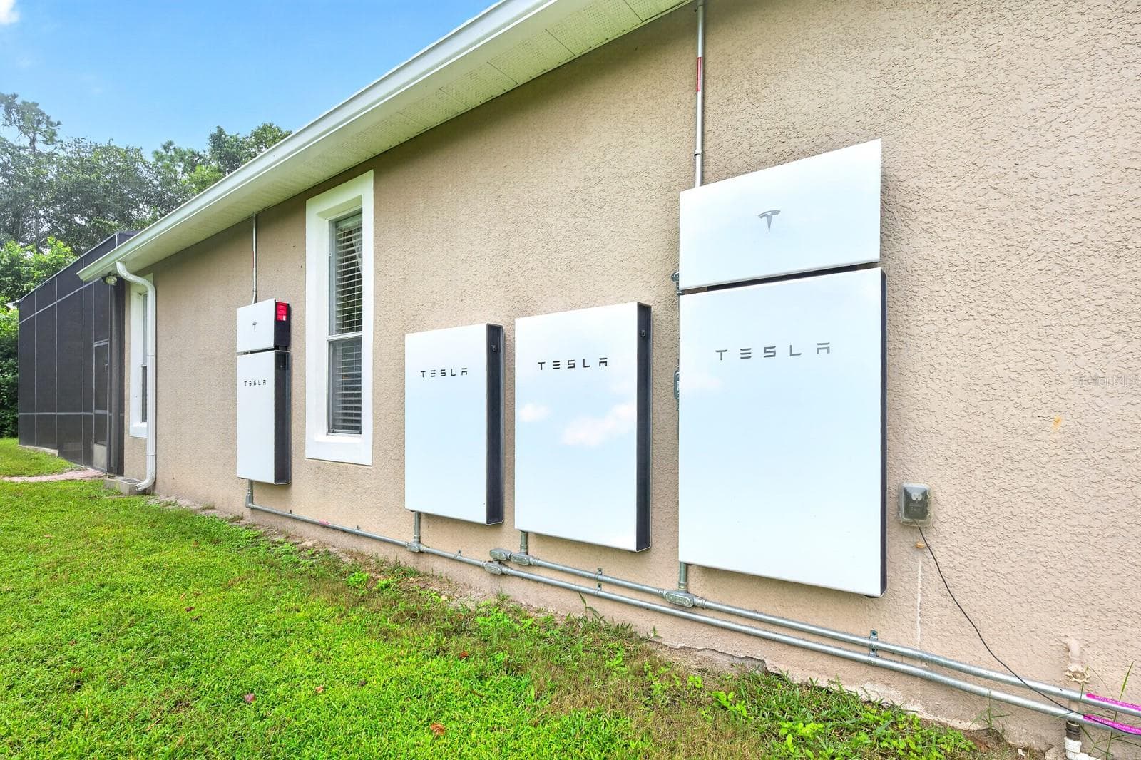 4 Tesla powerwalls leave this large home virtually free of any electric bills. - 609 VIANA CT, WINTER SPRINGS