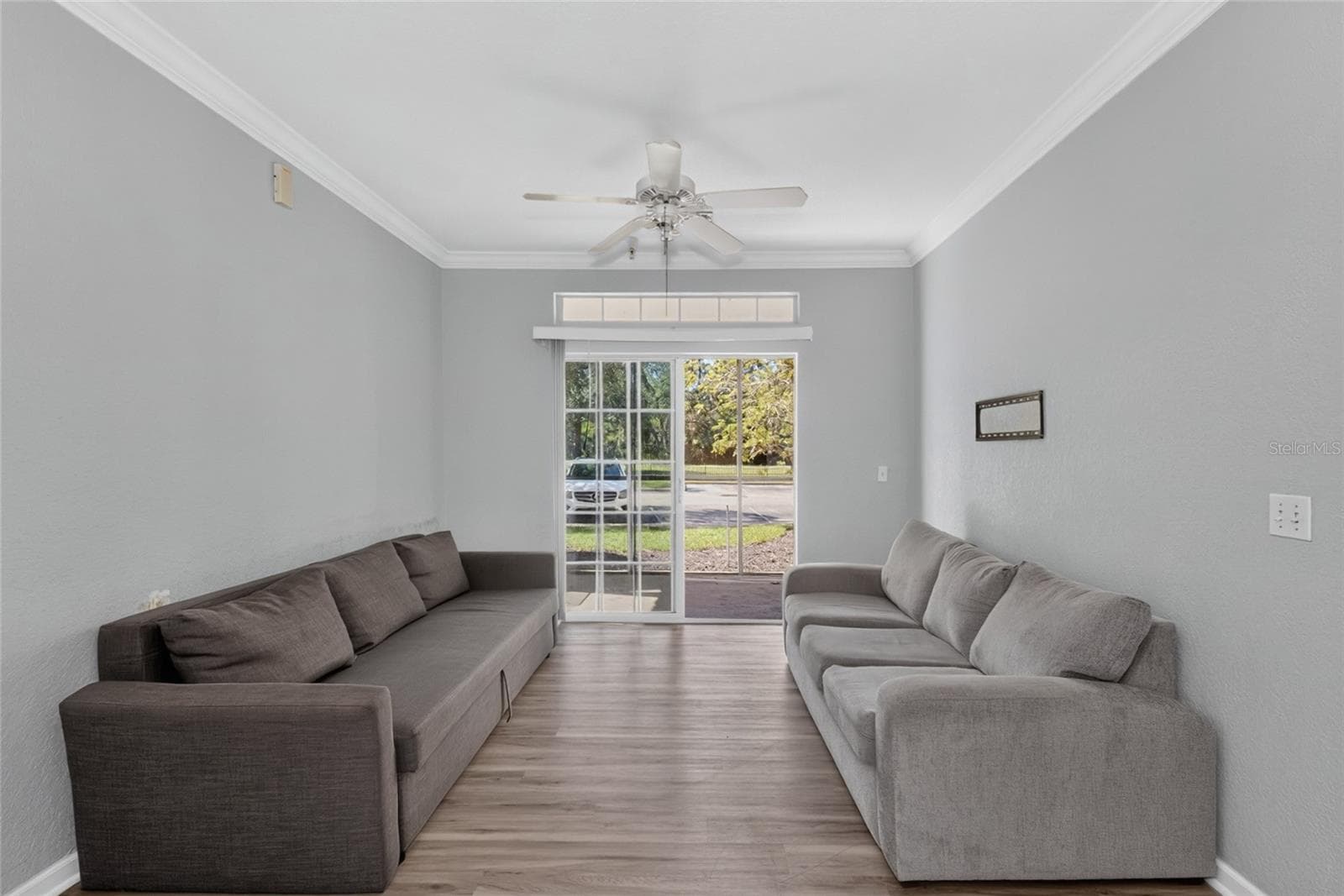 LIVING ROOM. Great SW facing light. - 1351 TUSCAN TER #8104, DAVENPORT