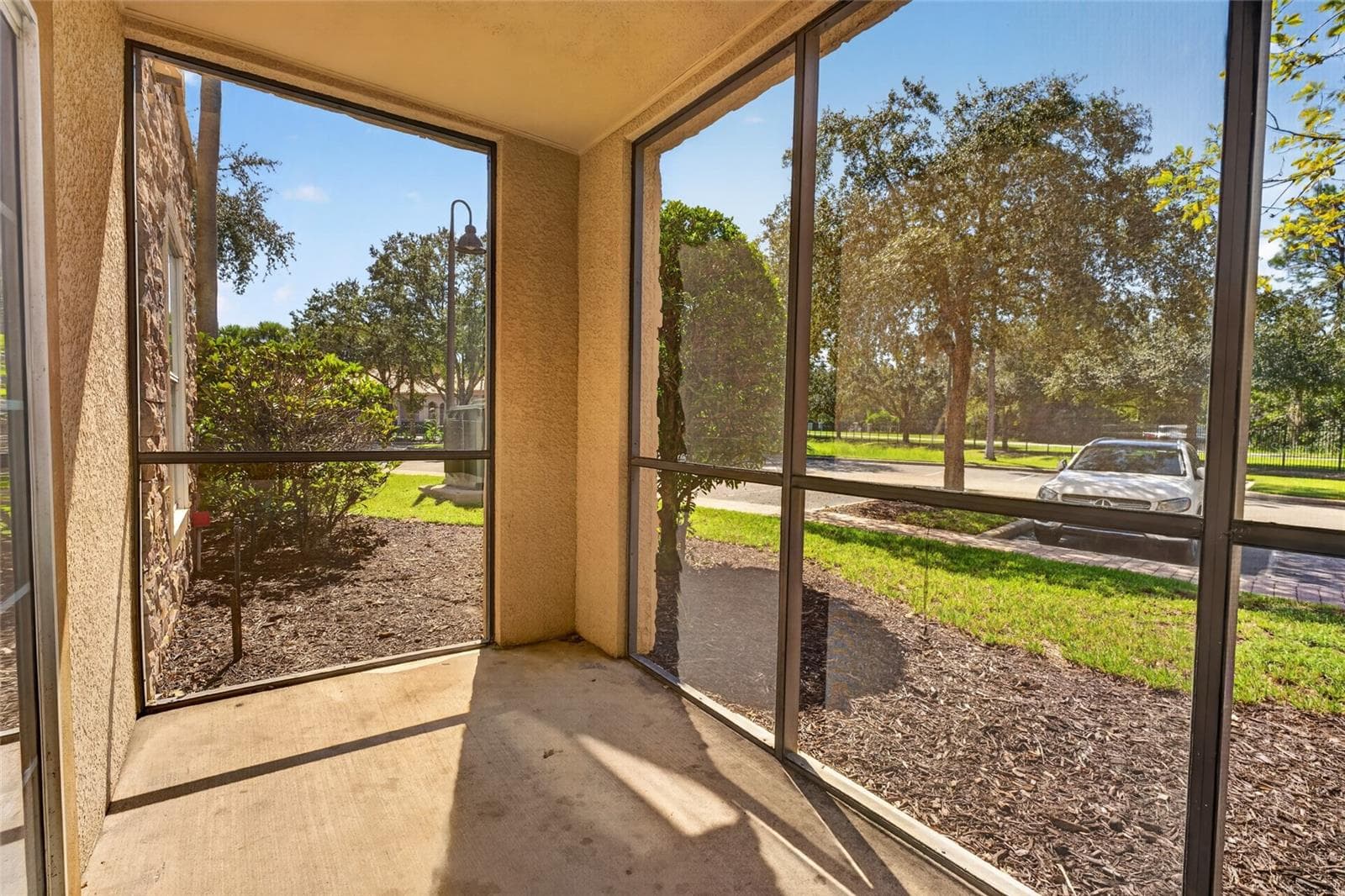 GROUND FLOOR SCREENED PATIO. SW FACING. - 1351 TUSCAN TER #8104, DAVENPORT