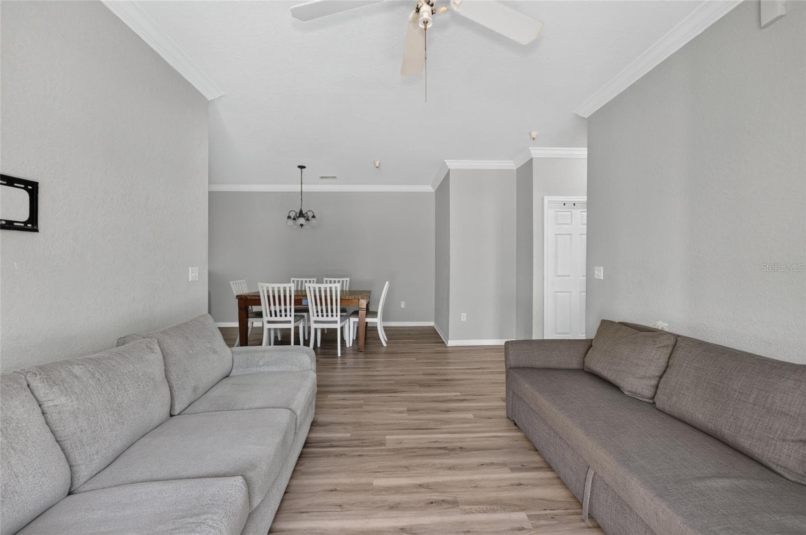 LIVING ROOM, facing dining space. Second and third bedrooms directly to the right. Shared hall bath (door shown right) - 1351 TUSCAN TER #8104, DAVENPORT