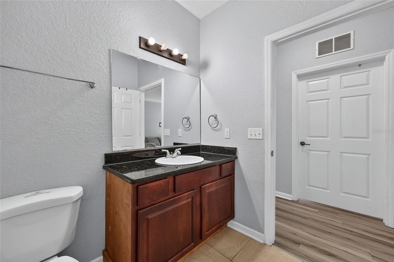FULL BATH, BACK HALLWAY. 2nd bedroom directly across, and 3rd bedroom (to the left). - 1351 TUSCAN TER #8104, DAVENPORT