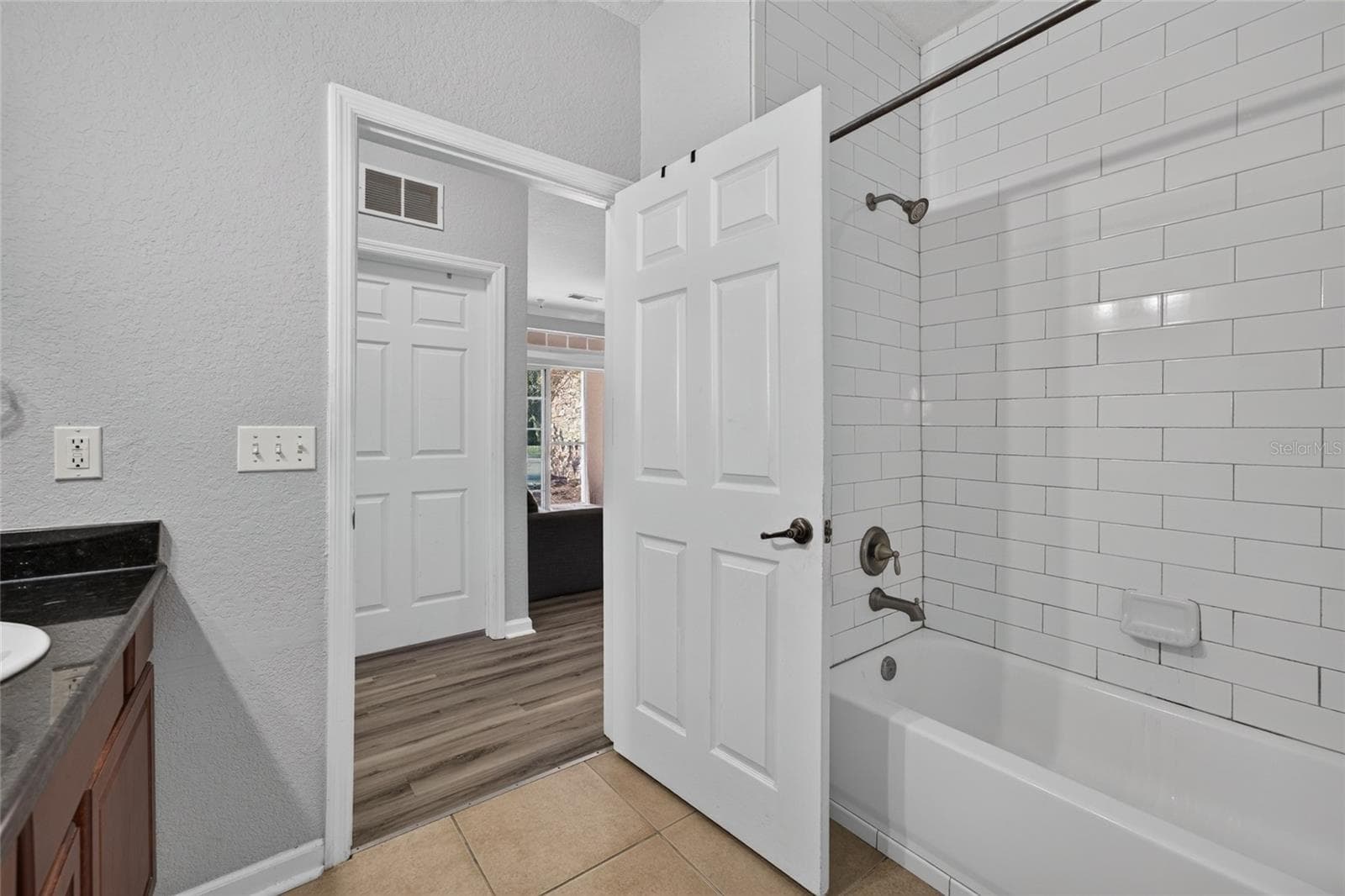 FULL BATH, HALLWAY. Shared bathroom for 2nd and 3rd bedrooms. 2nd bedroom directly across bath. 3rd bedroom (to the left). - 1351 TUSCAN TER #8104, DAVENPORT