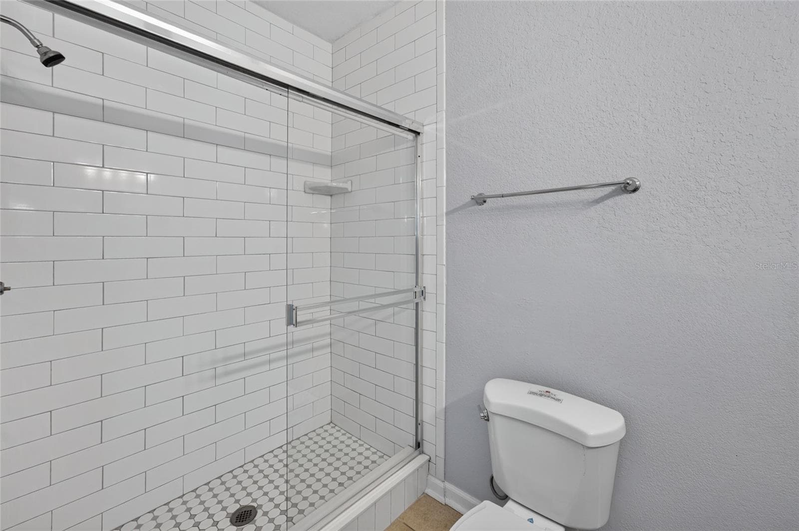 PRIMARY BATHROOM, subway tile walls. - 1351 TUSCAN TER #8104, DAVENPORT