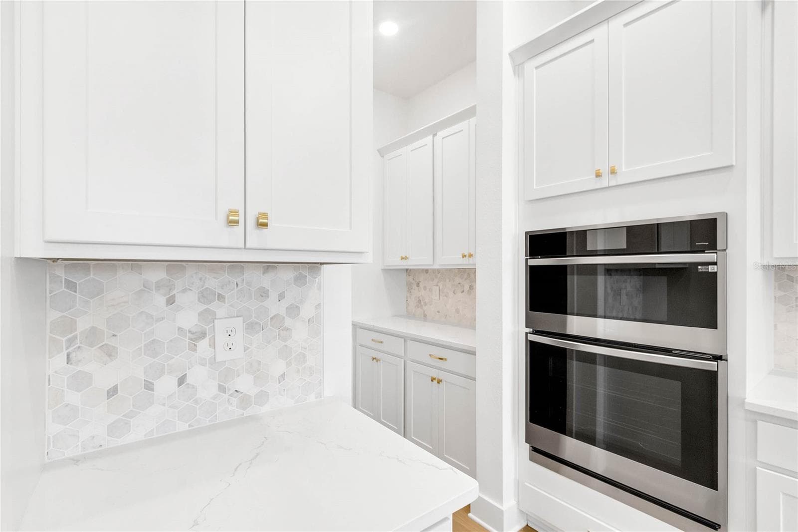 Kitchen (representative photo) - 17590 JAPONICA BLOOM DR, WINTER GARDEN