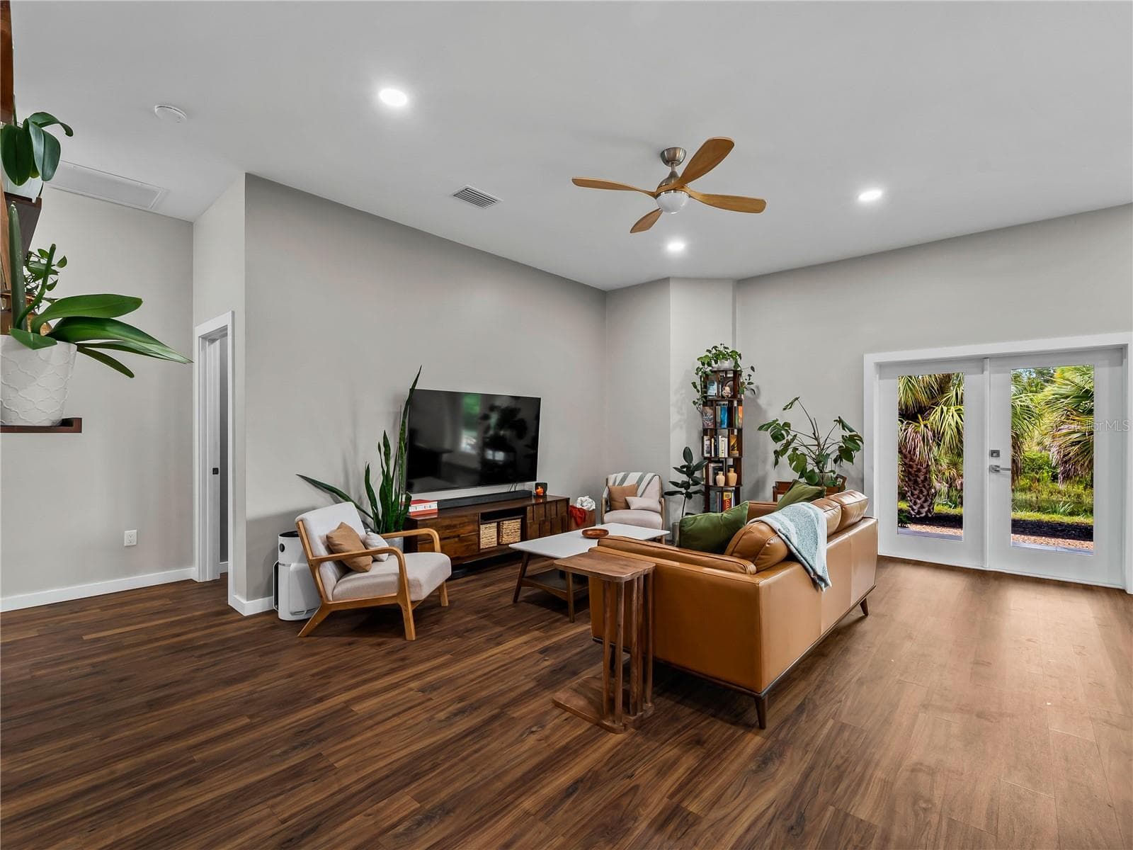 GreatRoom_8163WalbertSt_PortCharlotte_FrenchDoors_Corner.jpg - 8163 WALBERT ST, PORT CHARLOTTE