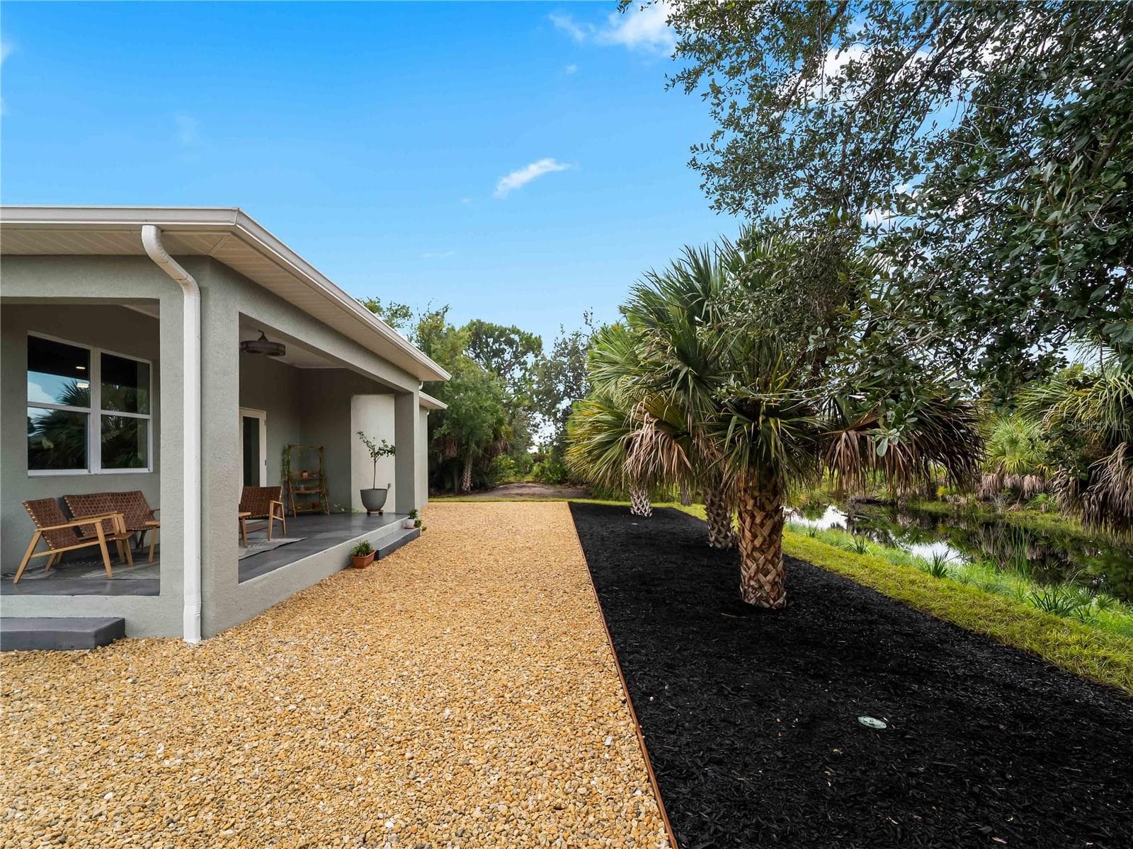 RearExterior_8163WalbertSt_PortCharlotte_Wide2.jpg - 8163 WALBERT ST, PORT CHARLOTTE