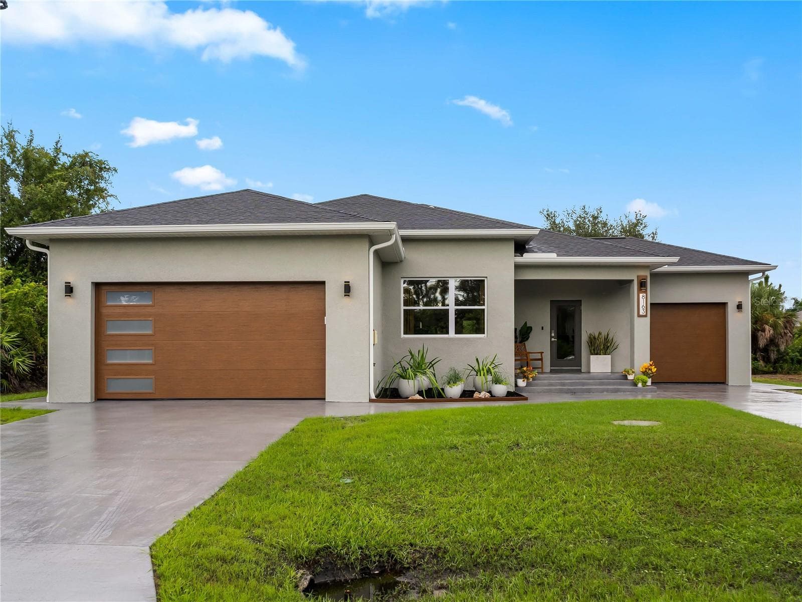FrontExterior_8163WalbertSt_PortCharlotte_Wide2.jpg - 8163 WALBERT ST, PORT CHARLOTTE