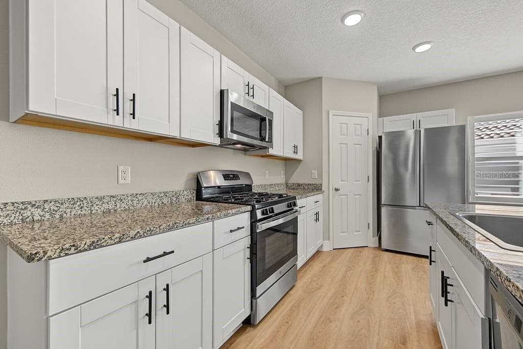 Townhouse at 2595 FENCEPOST DR, ODESSA, photo 12 of 59