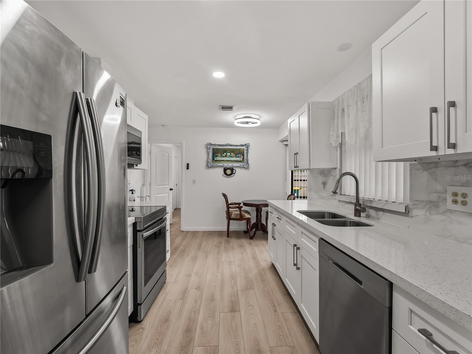 Kitchen_20307SilentAve_PortCharlotte_StainlessAppliances_Wide.jpg - 20307 SILENT AVE, PORT CHARLOTTE
