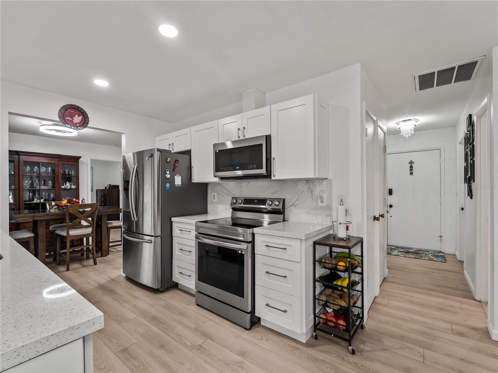 Kitchen_20307SilentAve_PortCharlotte_StainlessAppliances_Corner.jpg - 20307 SILENT AVE, PORT CHARLOTTE