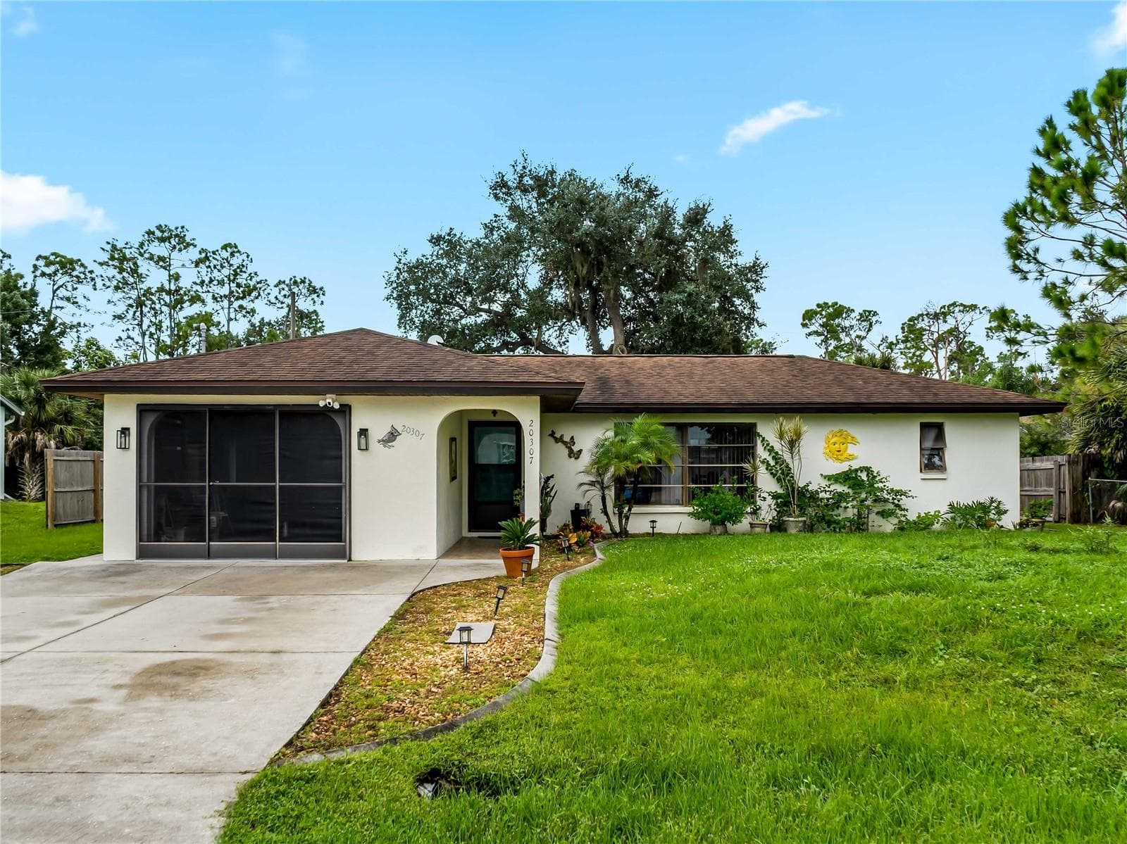 FrontExterior_20307SilentAve_PortCharlotte_CurbAppeal_Wide.jpg - 20307 SILENT AVE, PORT CHARLOTTE