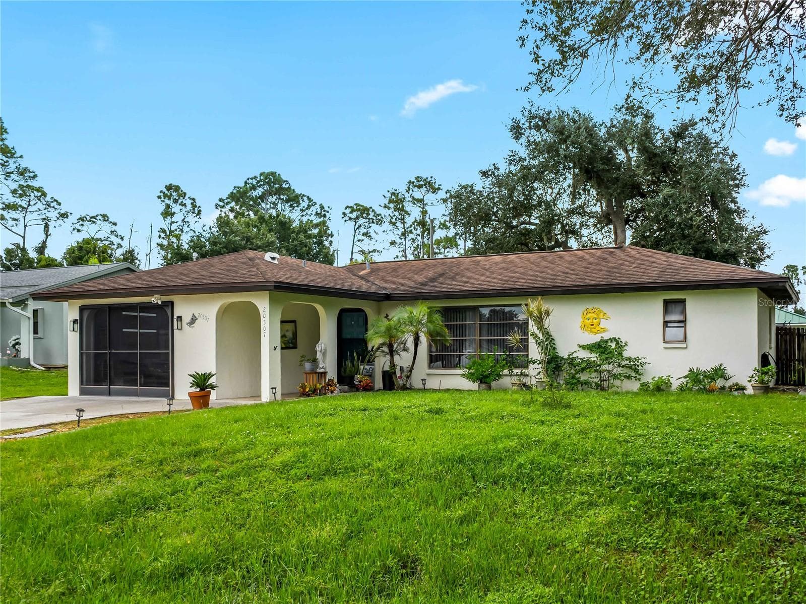 FrontExterior_20307SilentAve_PortCharlotte_CurbAppeal_Wide2.jpg - 20307 SILENT AVE, PORT CHARLOTTE