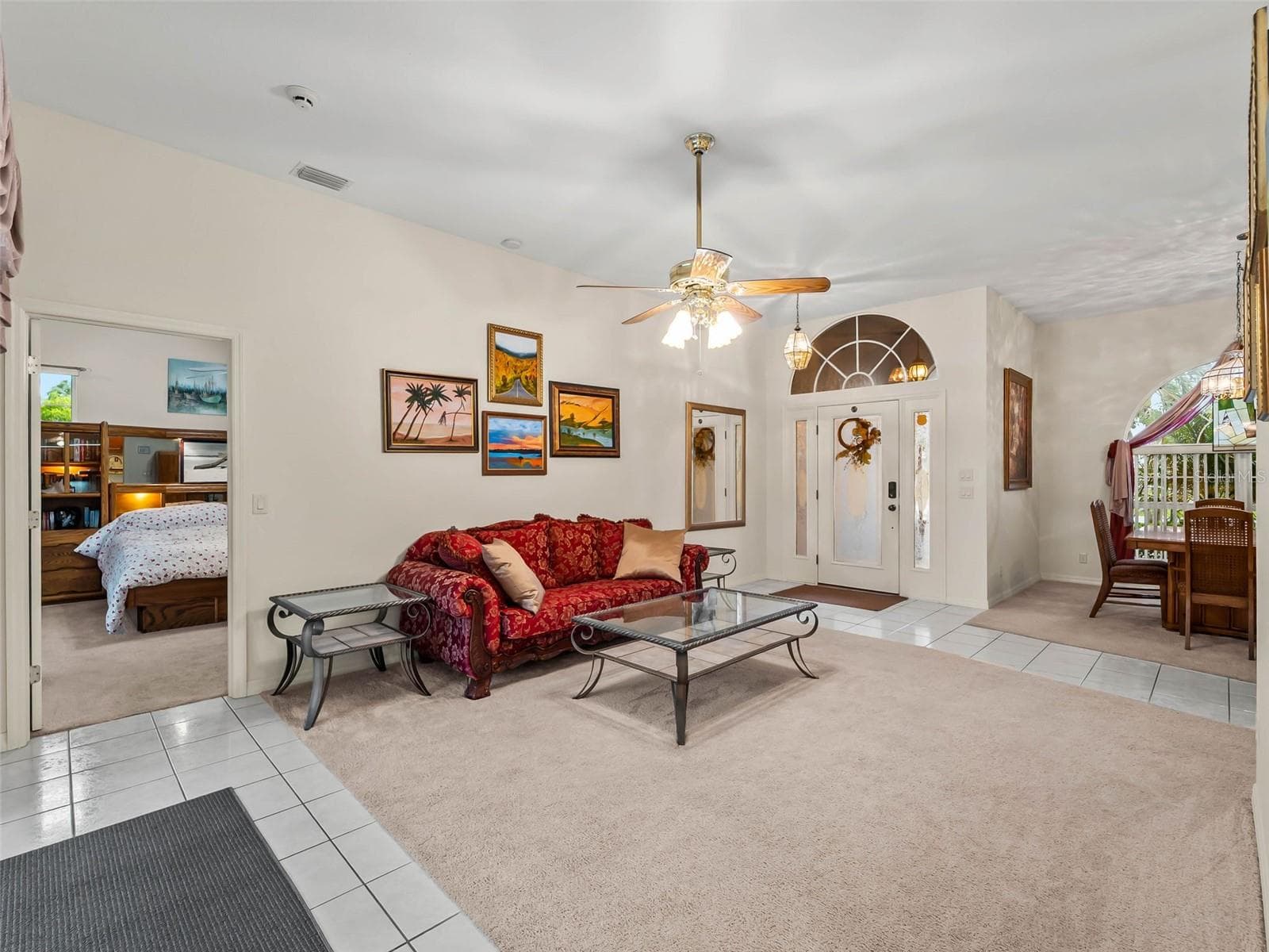 LivingRoom_9336StPaulDr_PortCharlotte_FoyerView_Corner.jpg - 9336 ST PAUL DR, PORT CHARLOTTE