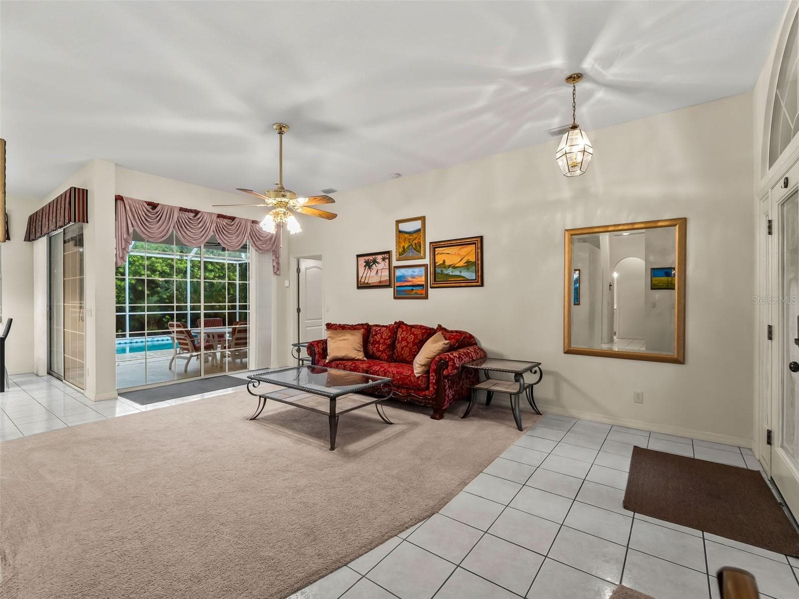 LivingRoom_9336StPaulDr_PortCharlotte_PoolView_Wide.jpg - 9336 ST PAUL DR, PORT CHARLOTTE