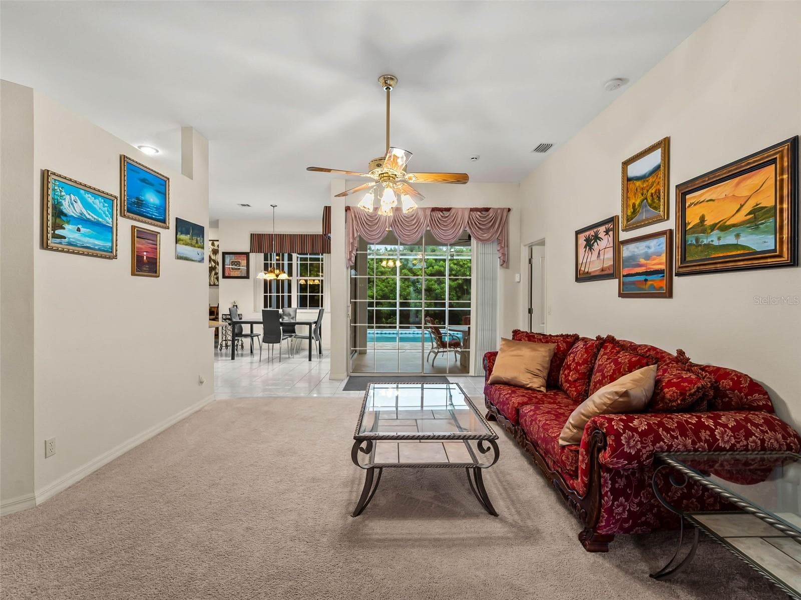 LivingRoom_9336StPaulDr_PortCharlotte_PoolAccess_SliderView.jpg - 9336 ST PAUL DR, PORT CHARLOTTE
