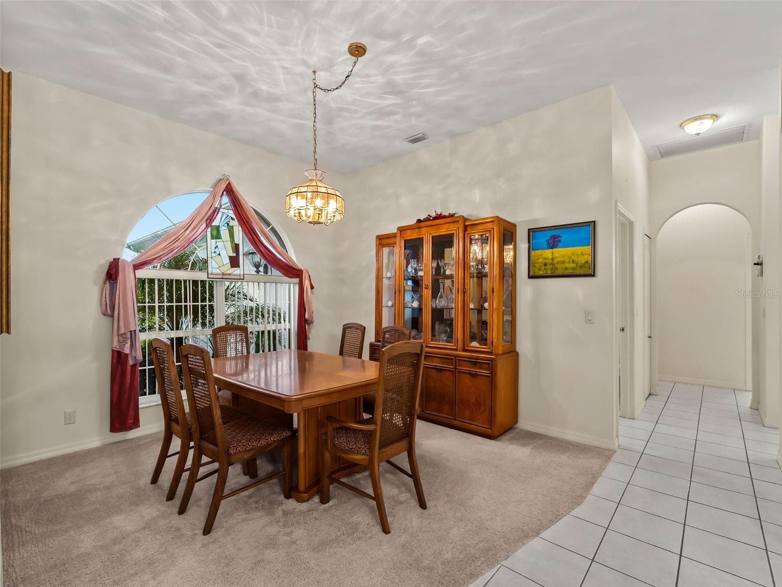 DiningRoom_9336StPaulDr_PortCharlotte_Chandelier_Wide.jpg - 9336 ST PAUL DR, PORT CHARLOTTE