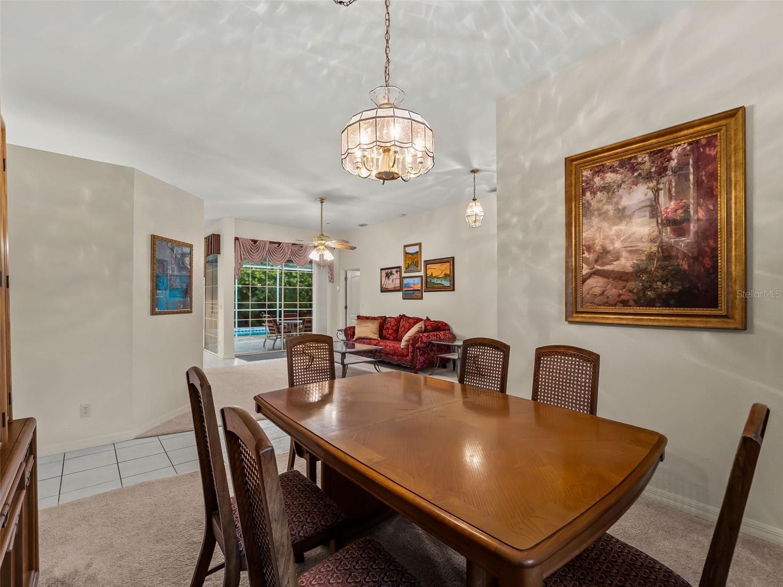DiningRoom_9336StPaulDr_PortCharlotte_Chandelier_Corner.jpg - 9336 ST PAUL DR, PORT CHARLOTTE
