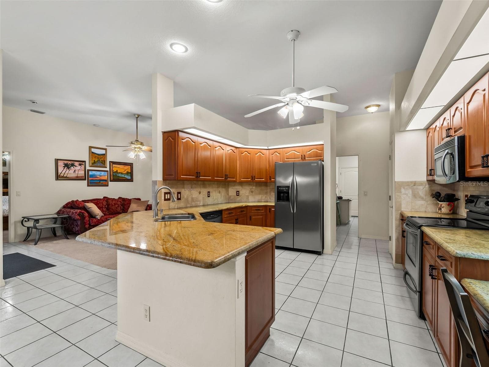 Kitchen_9336StPaulDr_PortCharlotte_StainlessAppliances_Wide.jpg - 9336 ST PAUL DR, PORT CHARLOTTE