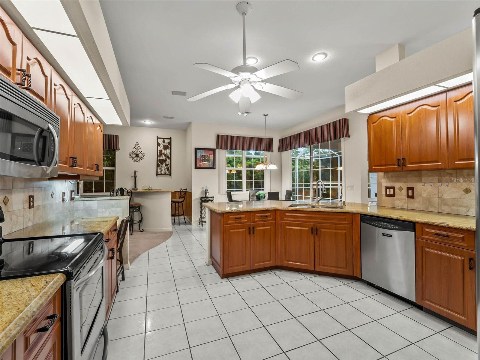 Kitchen_9336StPaulDr_PortCharlotte_BreakfastBar_Wide.jpg - 9336 ST PAUL DR, PORT CHARLOTTE