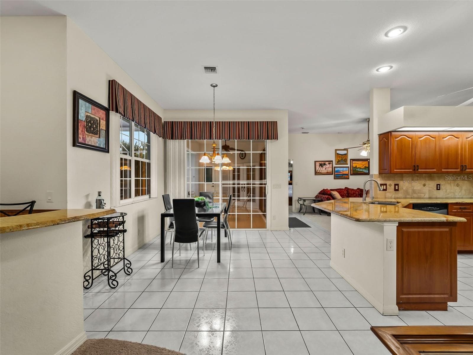 KitchenBreakfastNook_9336StPaulDr_PortCharlotte_OpenConcept_Corner.jpg - 9336 ST PAUL DR, PORT CHARLOTTE